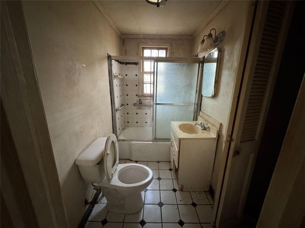 1096 3rd Street Northwest Atlanta, GA 30318 - Photo 17 of 17 a bathroom with a sink and mirror