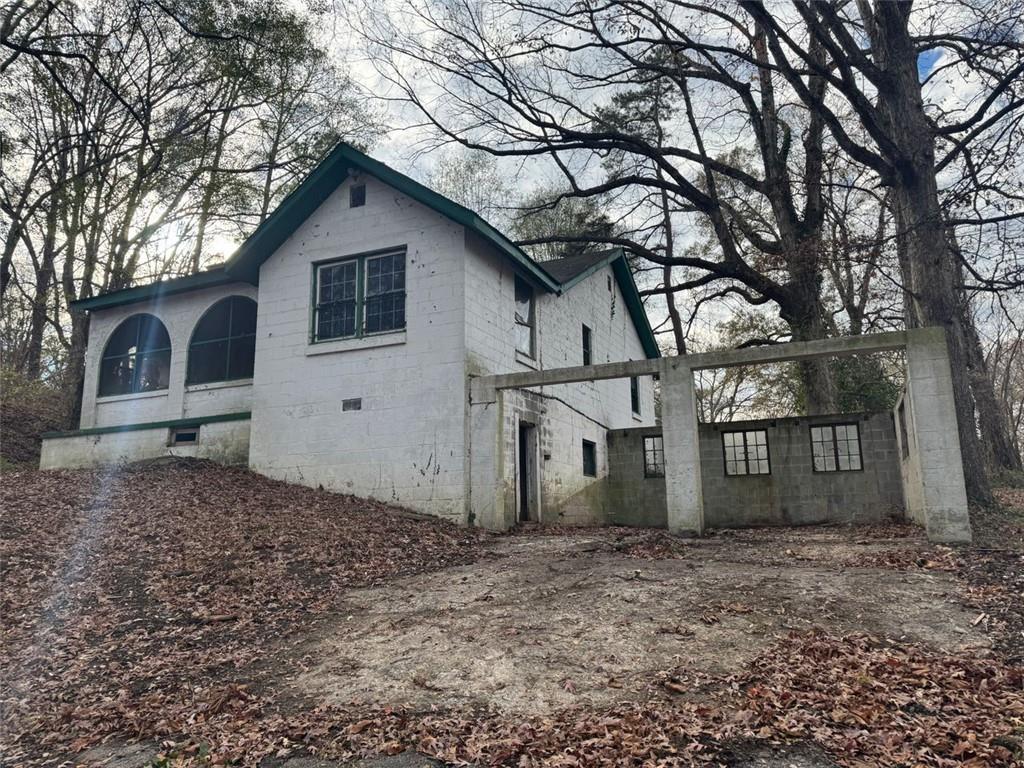 1096 3rd Street Northwest Atlanta, GA 30318 - Photo 6 of 17 a view of a house with a yard