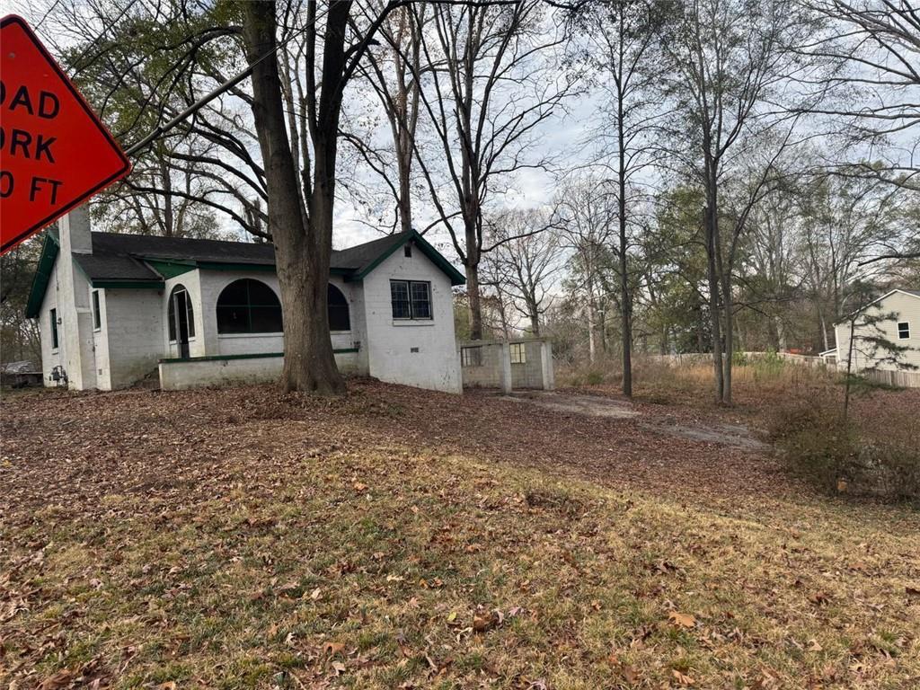 1096 3rd Street Northwest Atlanta, GA 30318 - Photo 7 of 17 a front view of a house with garden