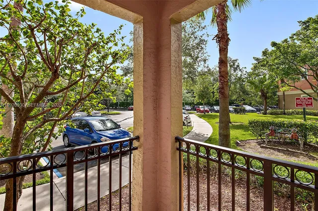 a view of a two chairs in the deck