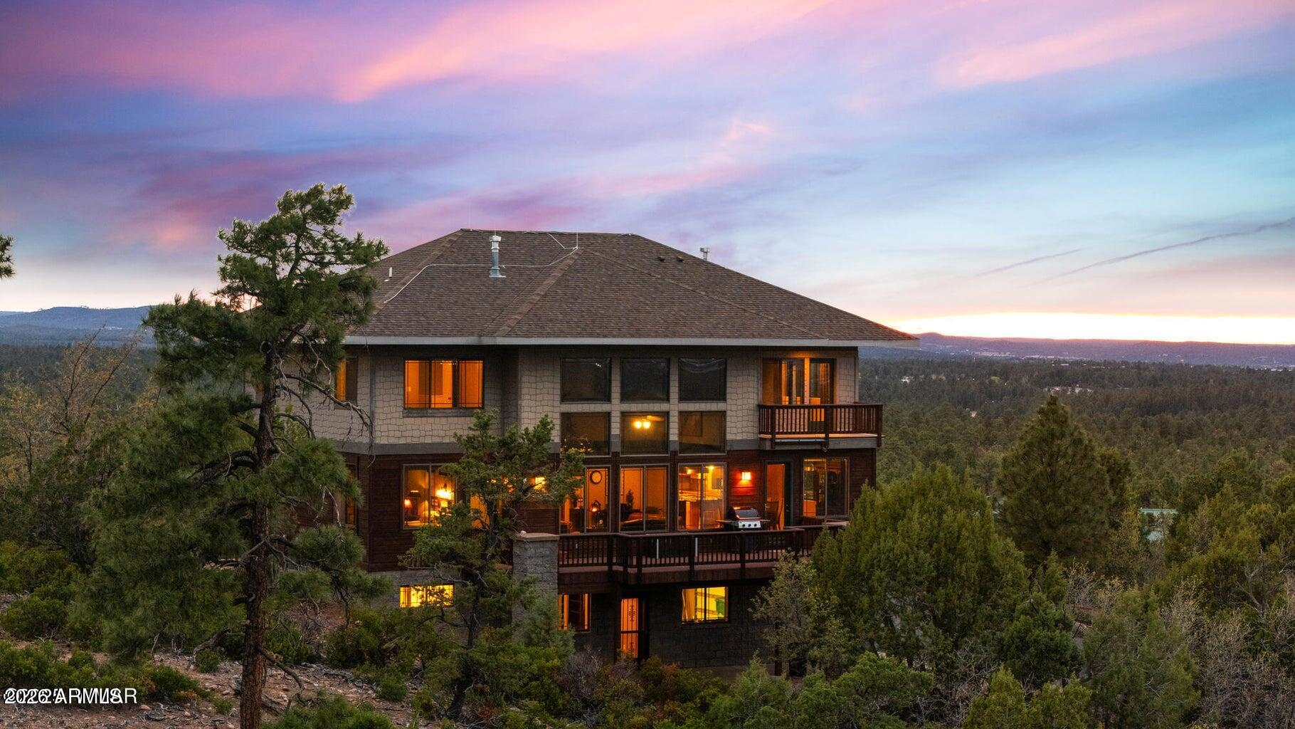 1511 South Canyon Ridge Trail Show Low, AZ 85901 - Photo 7 of 61 a front view of a house with a yard