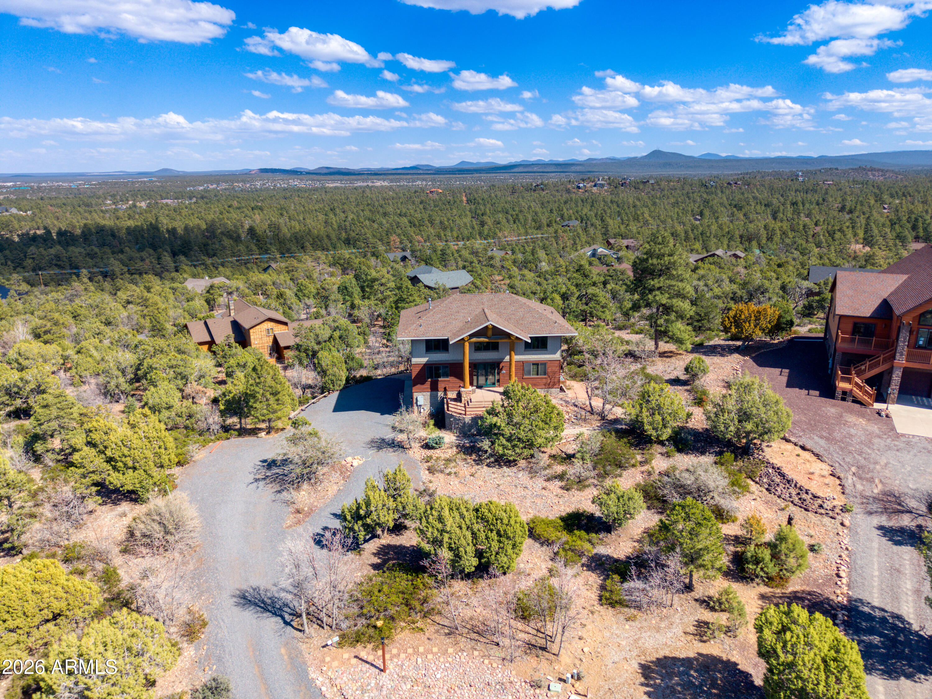 1511 South Canyon Ridge Trail Show Low, AZ 85901 - Photo 49 of 61 a view of a lake with a mountain in the background
