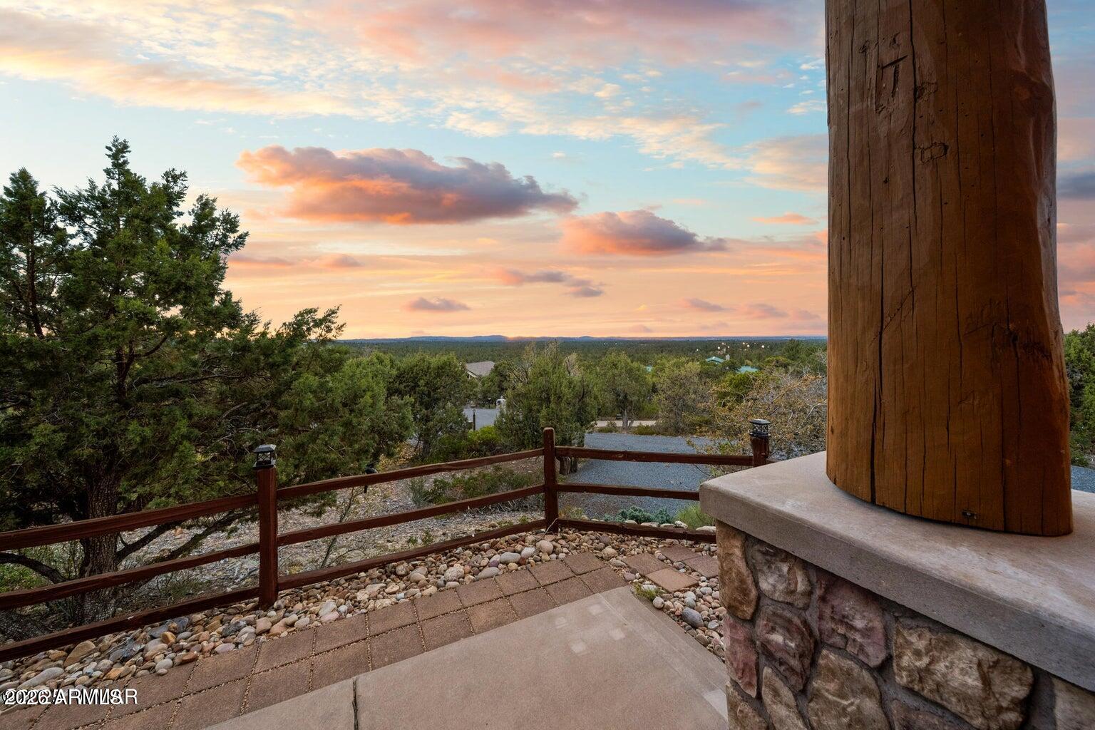 1511 South Canyon Ridge Trail Show Low, AZ 85901 - Photo 53 of 61 a view of a terrace with a bench