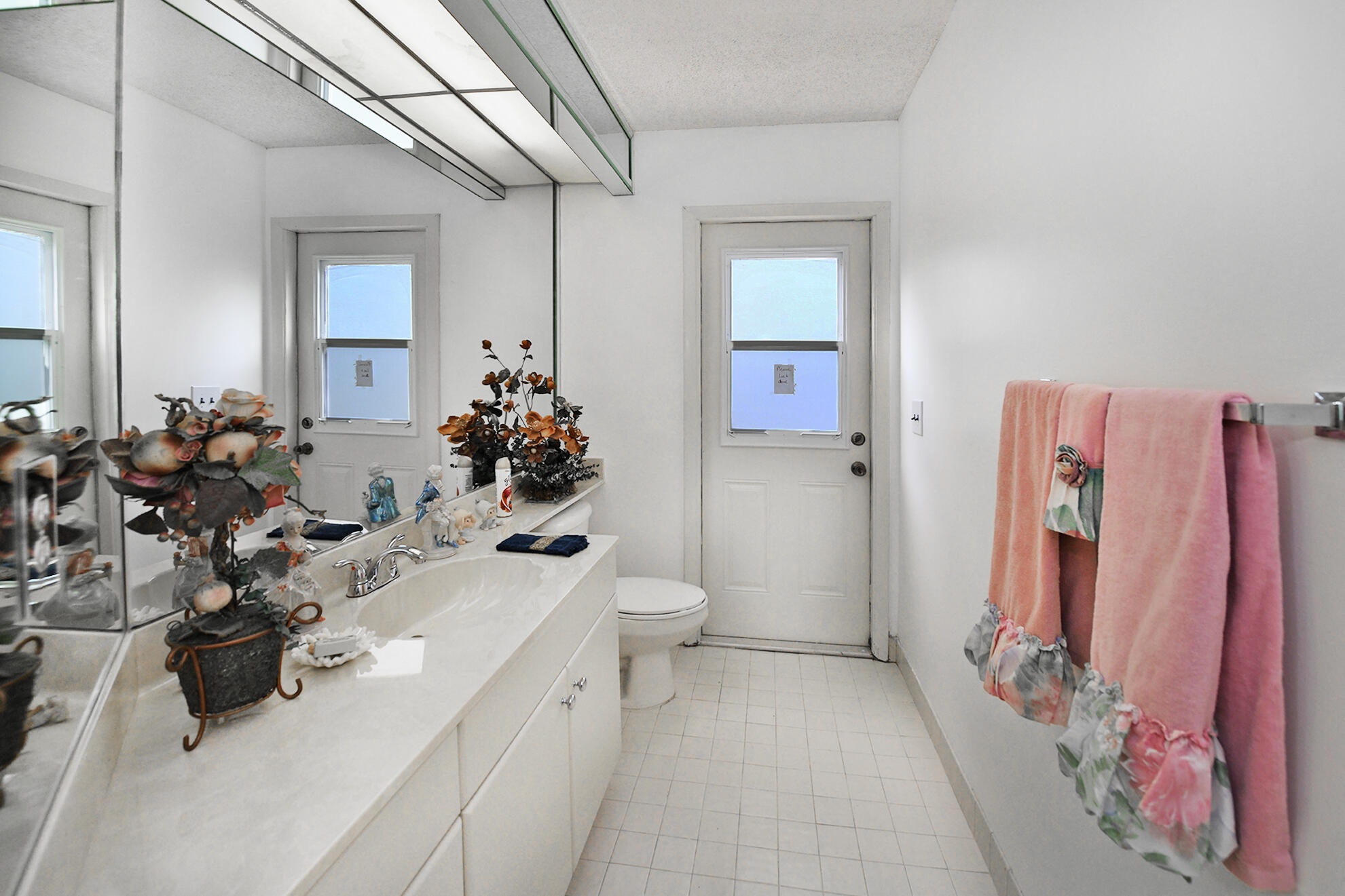 5135 Pointe Alexis Boca Raton, FL 33431 - Photo 18 of 35 a bathroom with a sink a toilet and shower