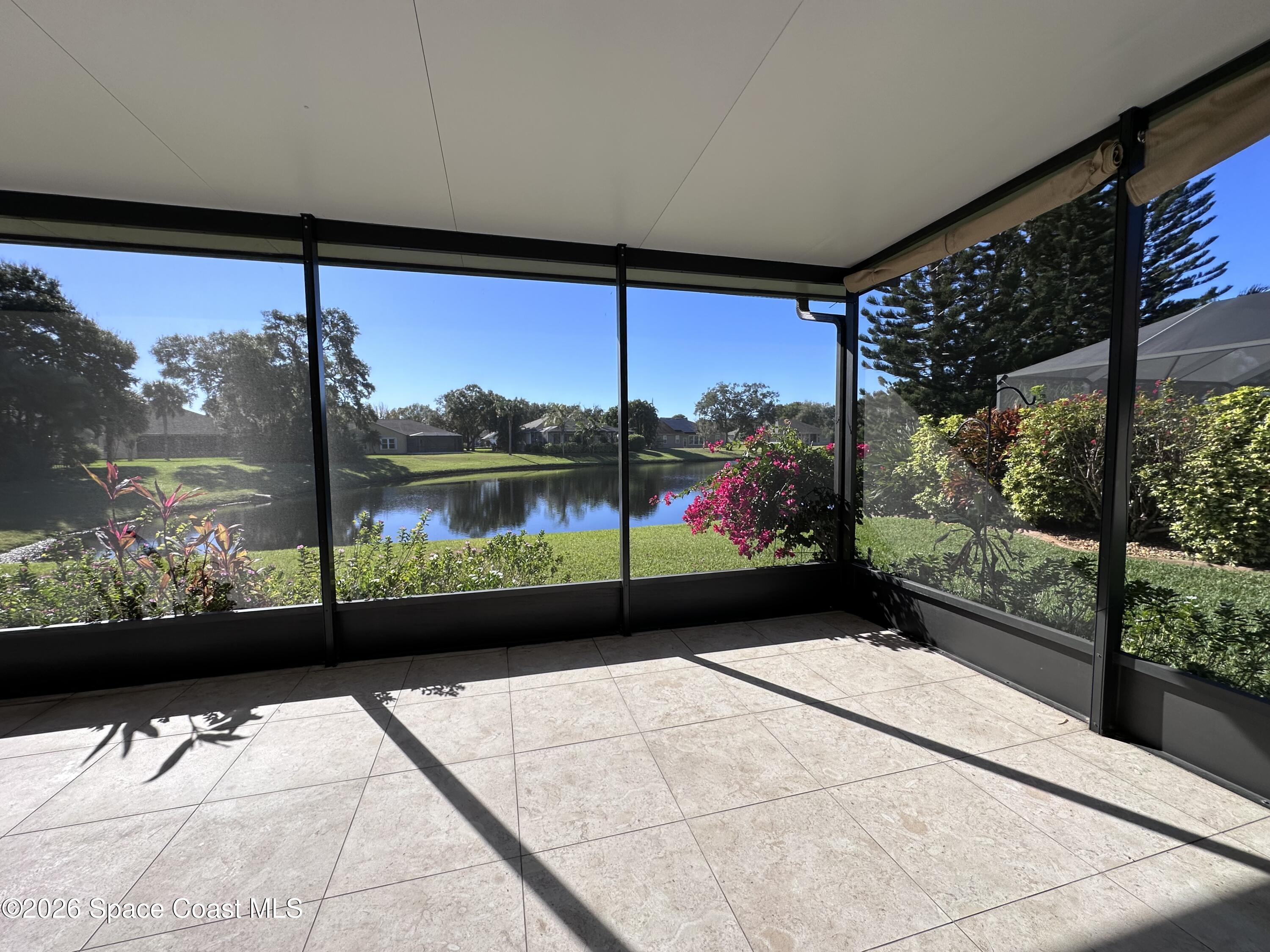883 Spring Oak Drive Melbourne, FL 32901 - Photo 29 of 43 a view of a porch with a potted plant