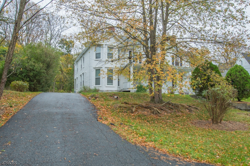 55 Madison Street, Unit 3 Newton, NJ 07860 - Photo 13 of 15 a front view of a house with a yard