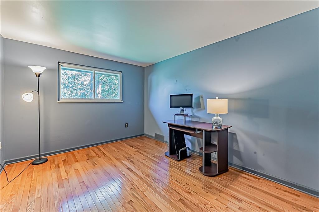 1858 Sample Road Allison Park, PA 15101 - Photo 23 of 25 a room with furniture and wooden floor
