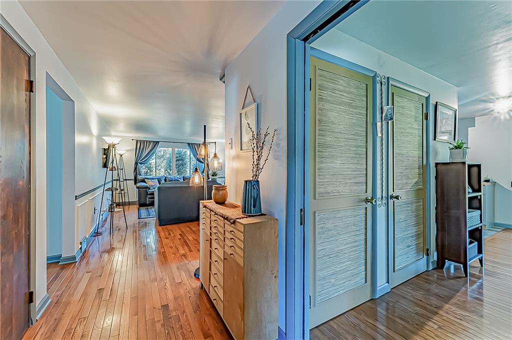 1858 Sample Road Allison Park, PA 15101 - Photo 5 of 25 a view of a hallway view with wooden floor and furniture