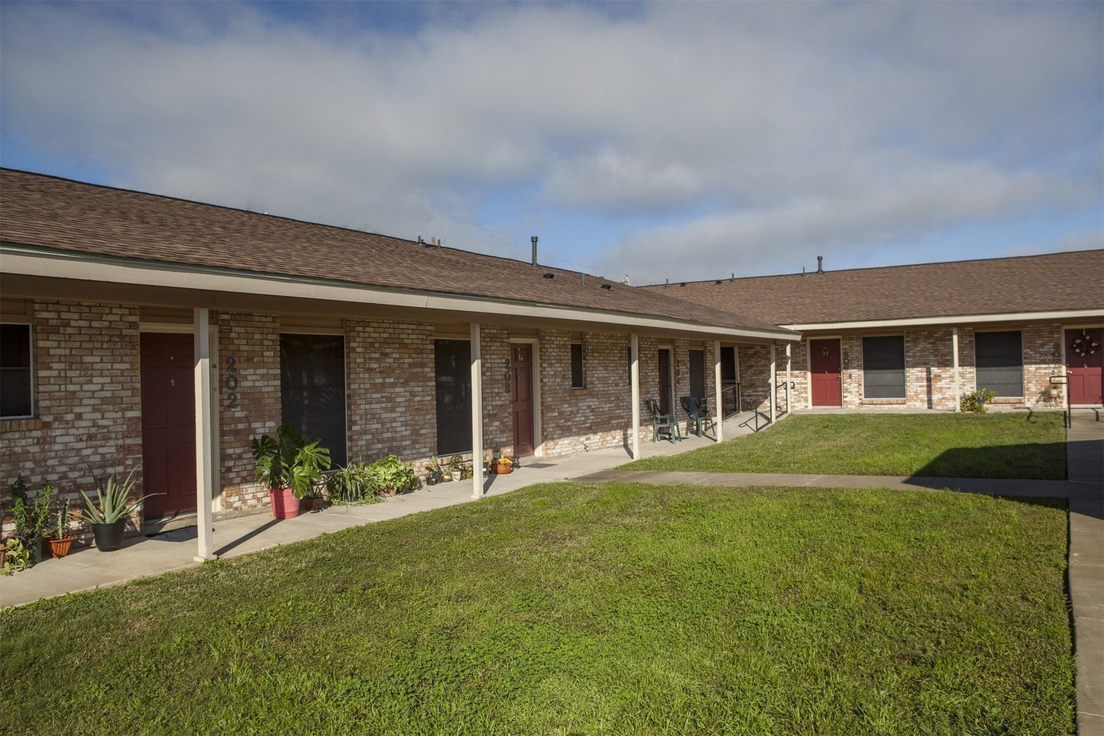 8219 Perrin Beitel Road San Antonio, TX 78218 - Photo 1 of 18 front view of a house with a yard