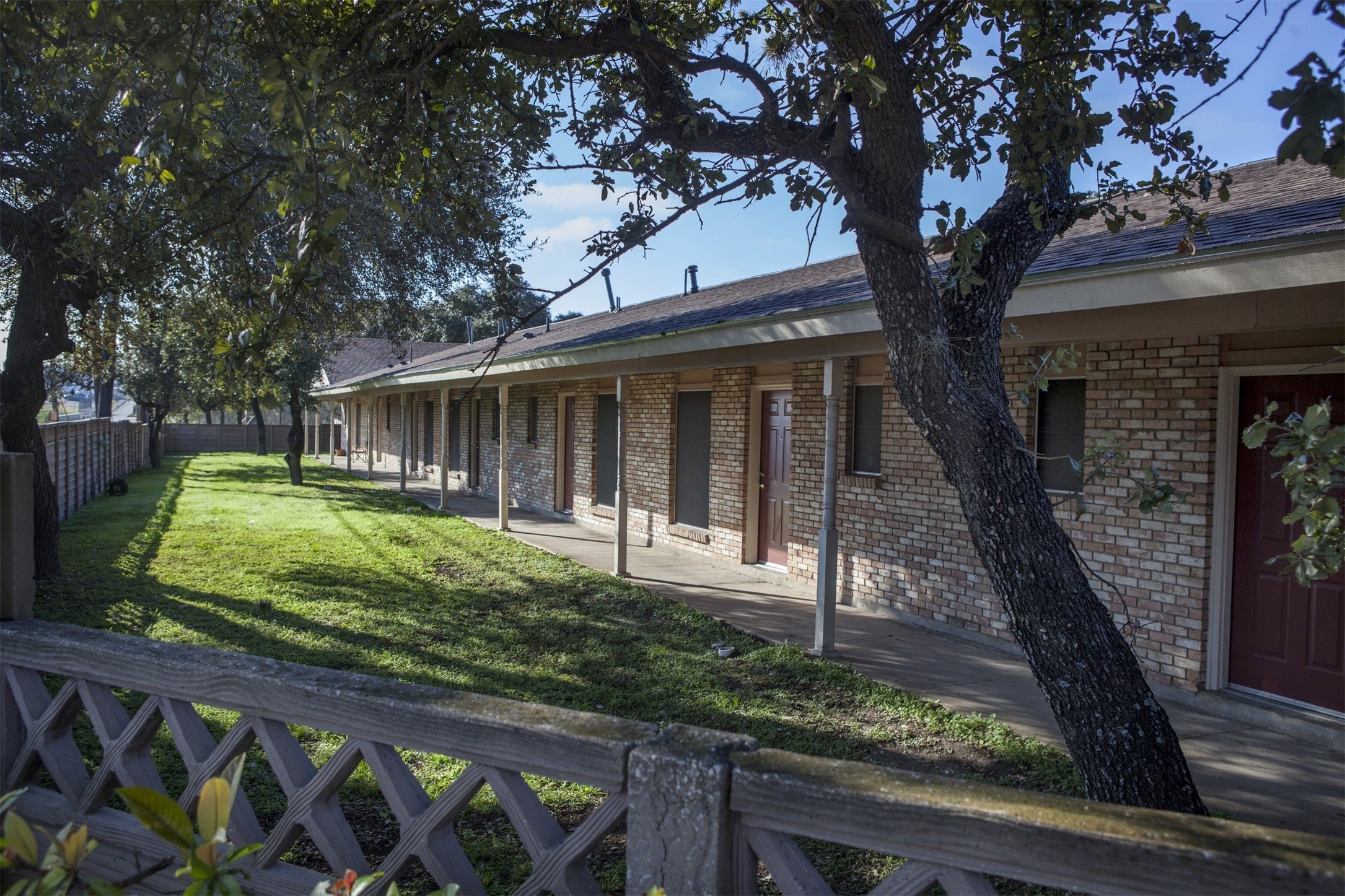 8219 Perrin Beitel Road San Antonio, TX 78218 - Photo 12 of 18 a front view of a house with garden