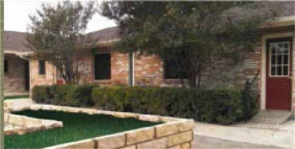 a view of a back yard of the house
