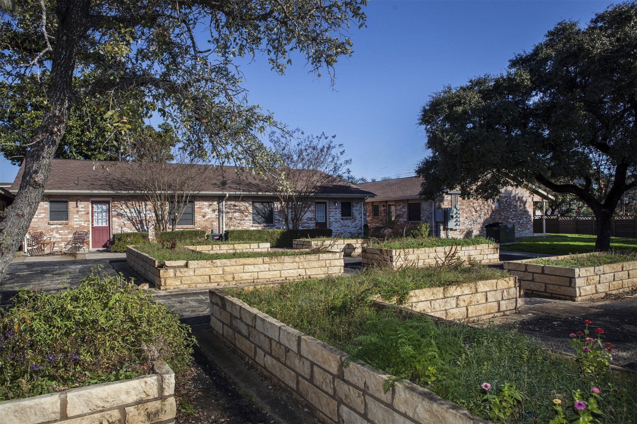 8219 Perrin Beitel Road San Antonio, TX 78218 - Photo 3 of 18 a view of house with swimming pool and a yard