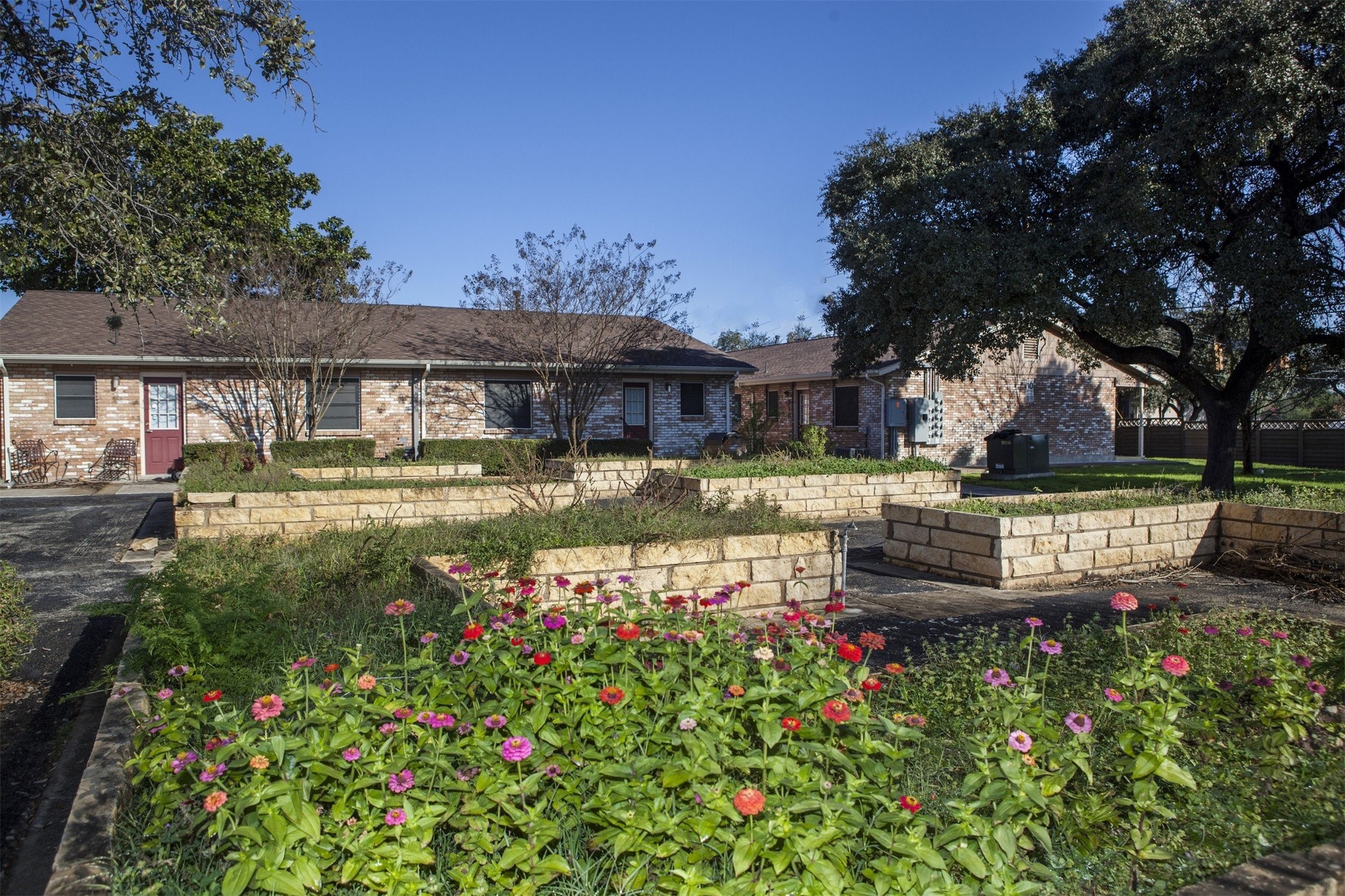 8219 Perrin Beitel Road San Antonio, TX 78218 - Photo 8 of 18 a view of swimming pool with outdoor seating and a tree