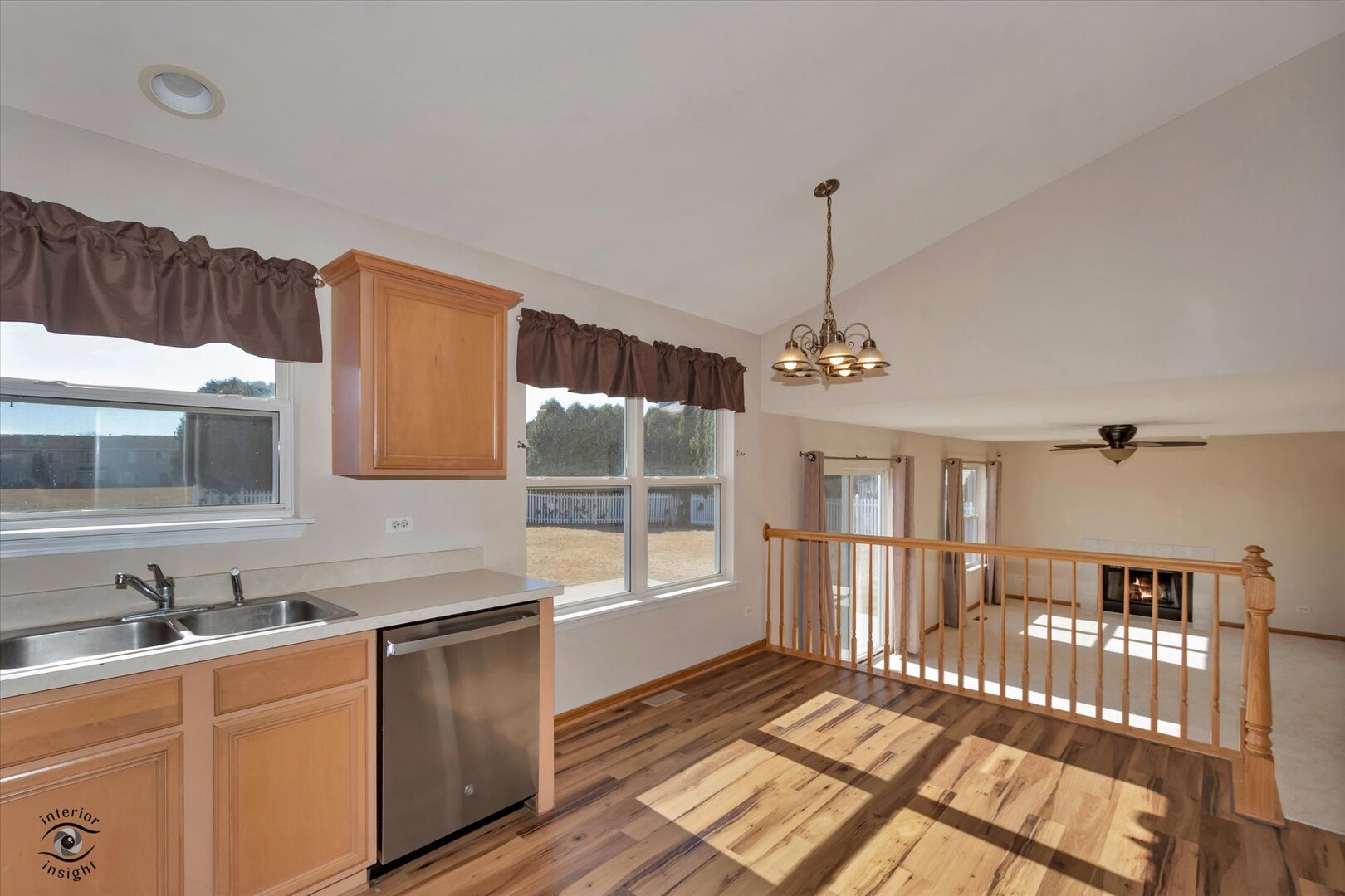 1606 Donegal Drive Minooka, IL 60447 - Photo 8 of 25 a kitchen with stainless steel appliances granite countertop a sink and cabinets