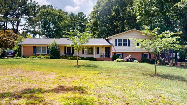 a front view of a house with swimming pool