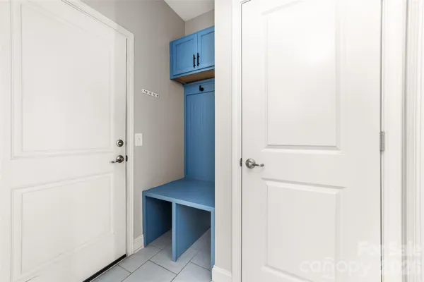 a view of a kitchen from the hallway