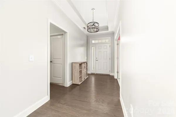 a view of an entryway with hallway