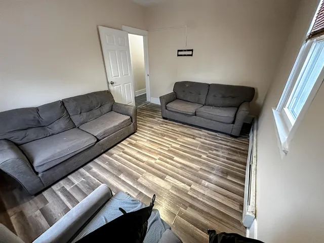 a living room with couches and a coffee table
