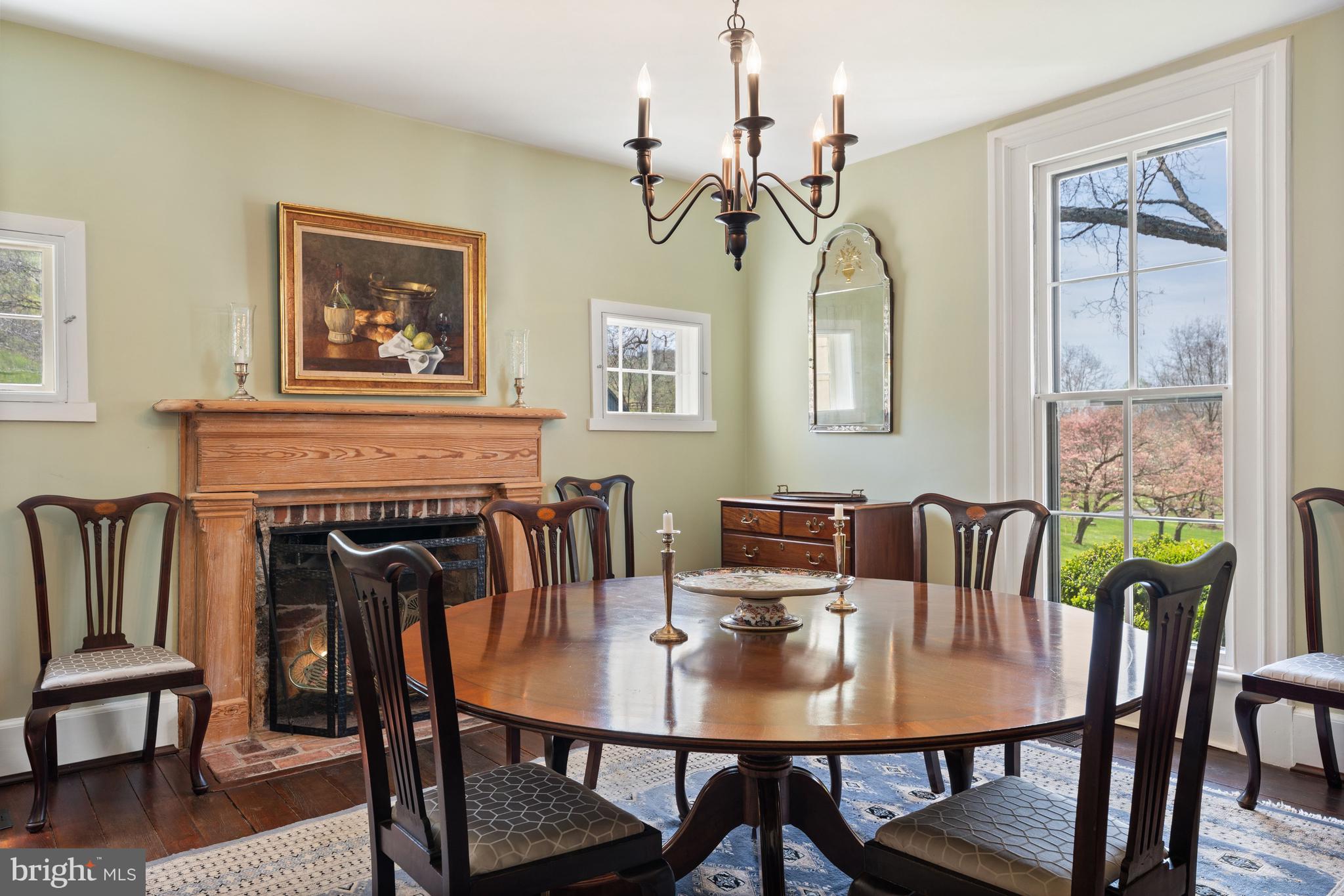 3459 Carrington Road Delaplane, VA 20144 - Photo 13 of 106 a view of a dining room with furniture window and wooden floor