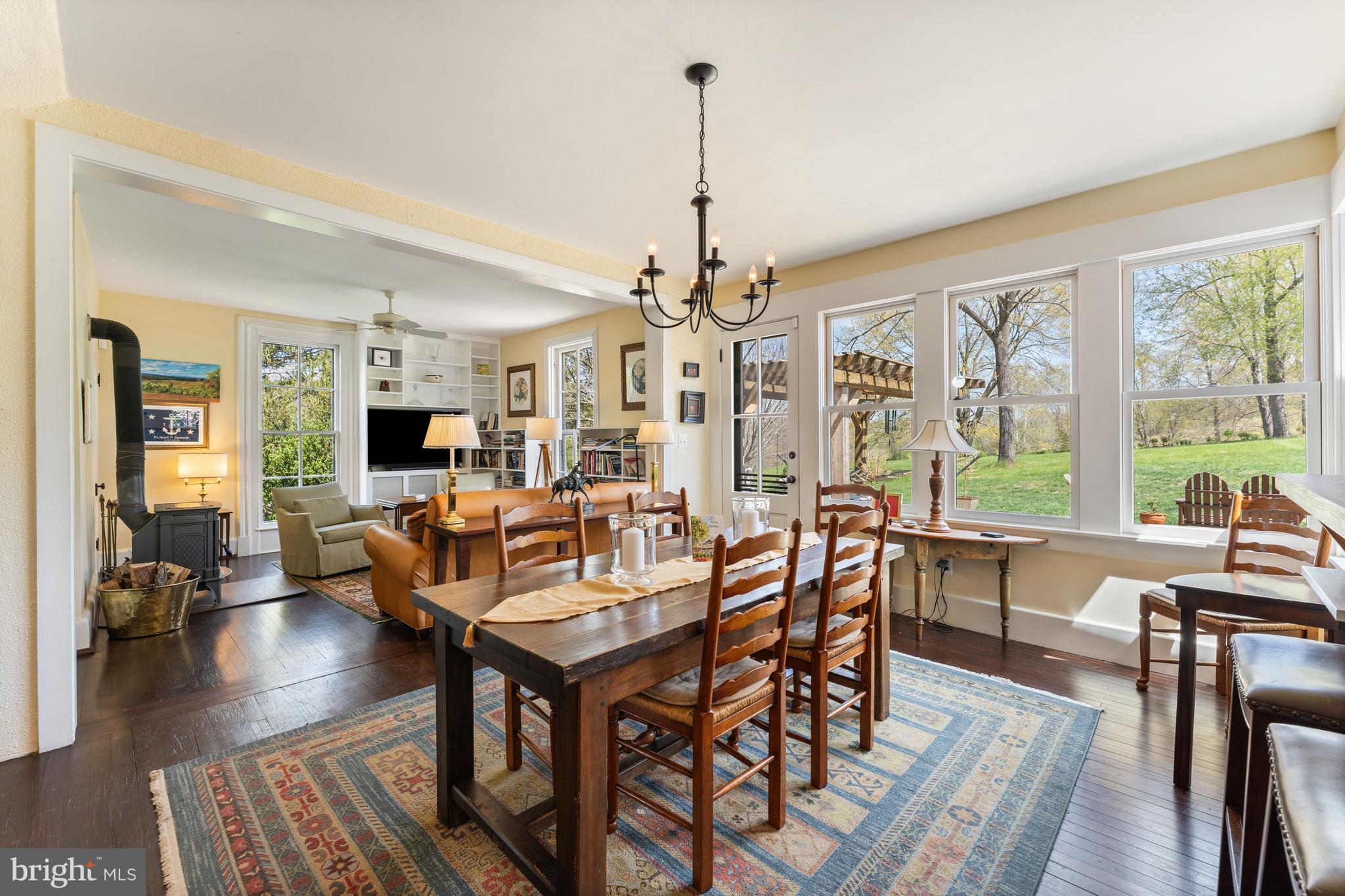 3459 Carrington Road Delaplane, VA 20144 - Photo 17 of 106 a view of a dining room with furniture window and wooden floor