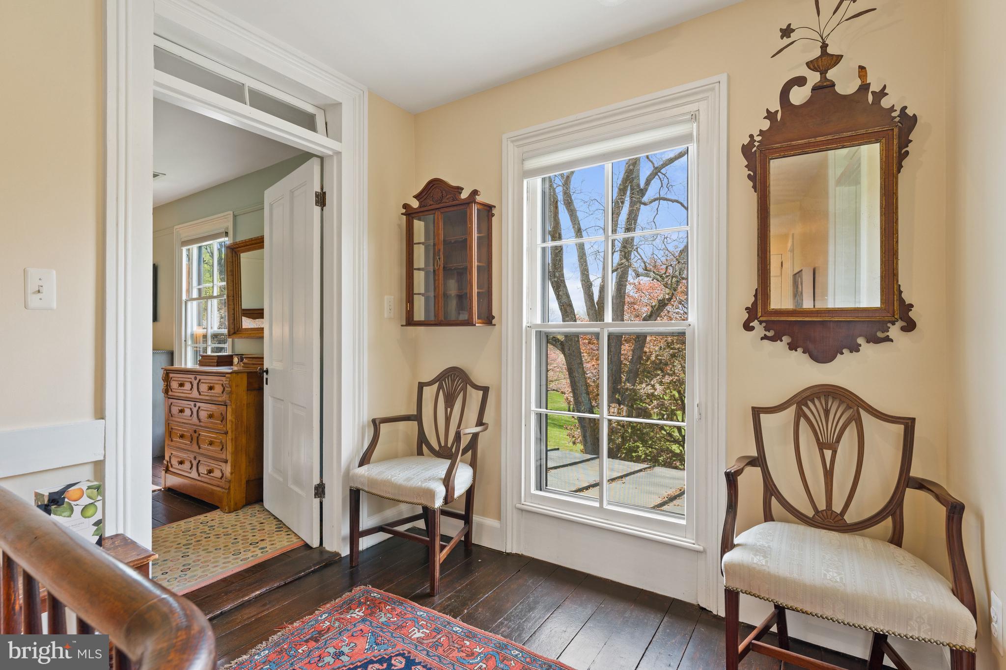 3459 Carrington Road Delaplane, VA 20144 - Photo 28 of 106 a living room with furniture a flat screen tv and a window