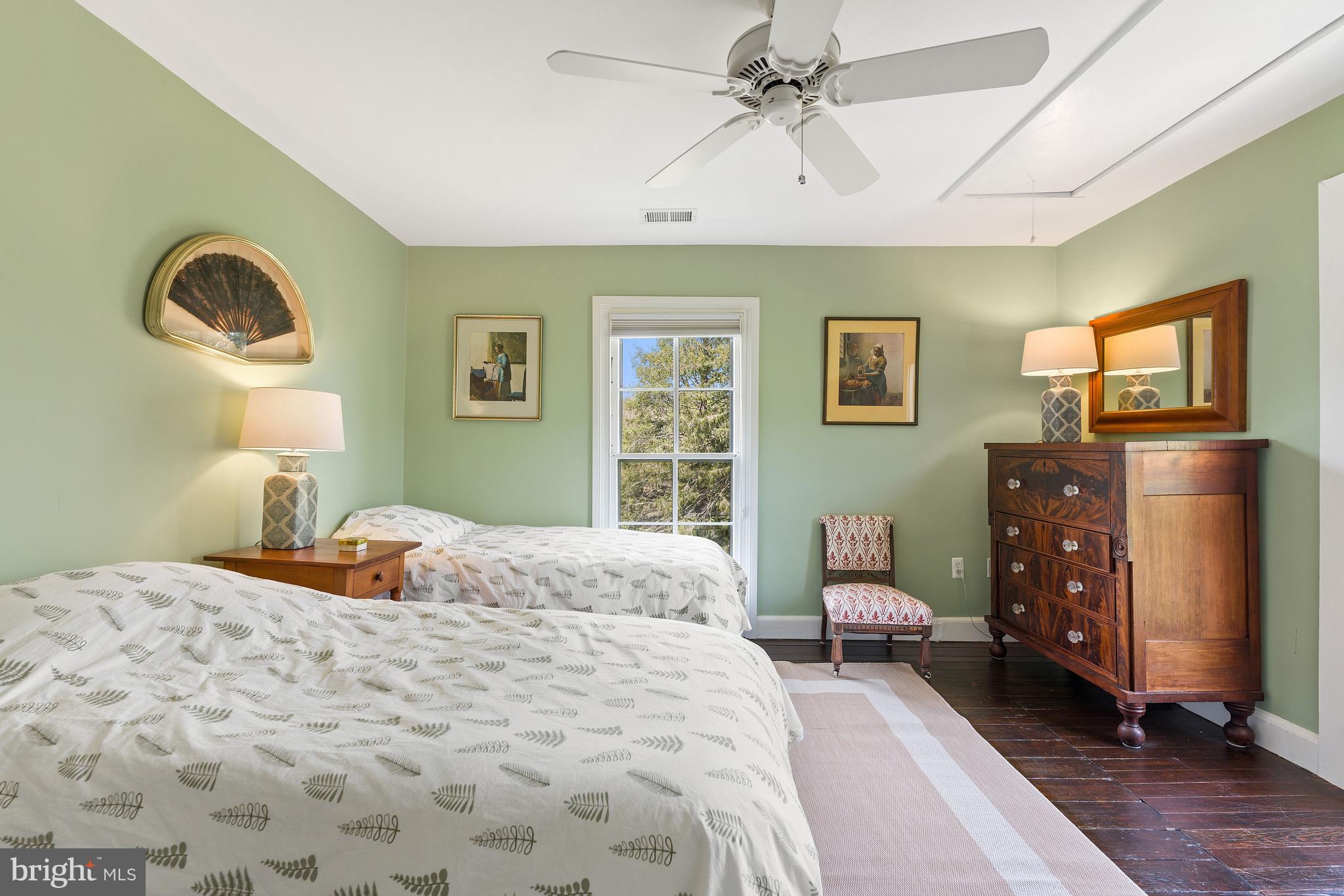 3459 Carrington Road Delaplane, VA 20144 - Photo 36 of 106 a bedroom with a bed wooden floor and window