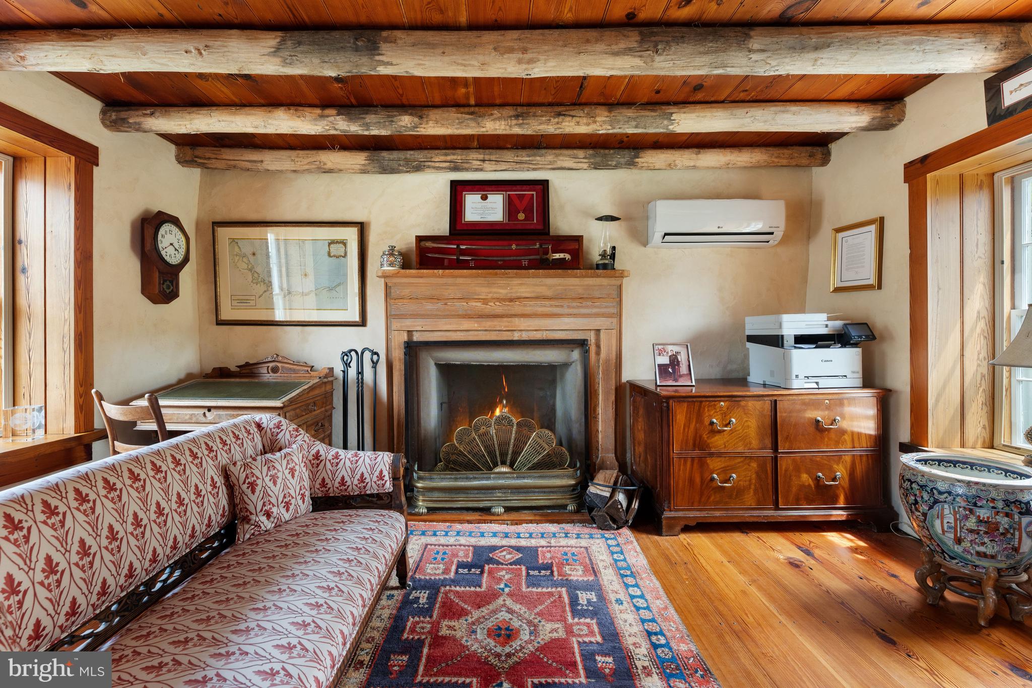 3459 Carrington Road Delaplane, VA 20144 - Photo 46 of 106 a living room with furniture and a fireplace