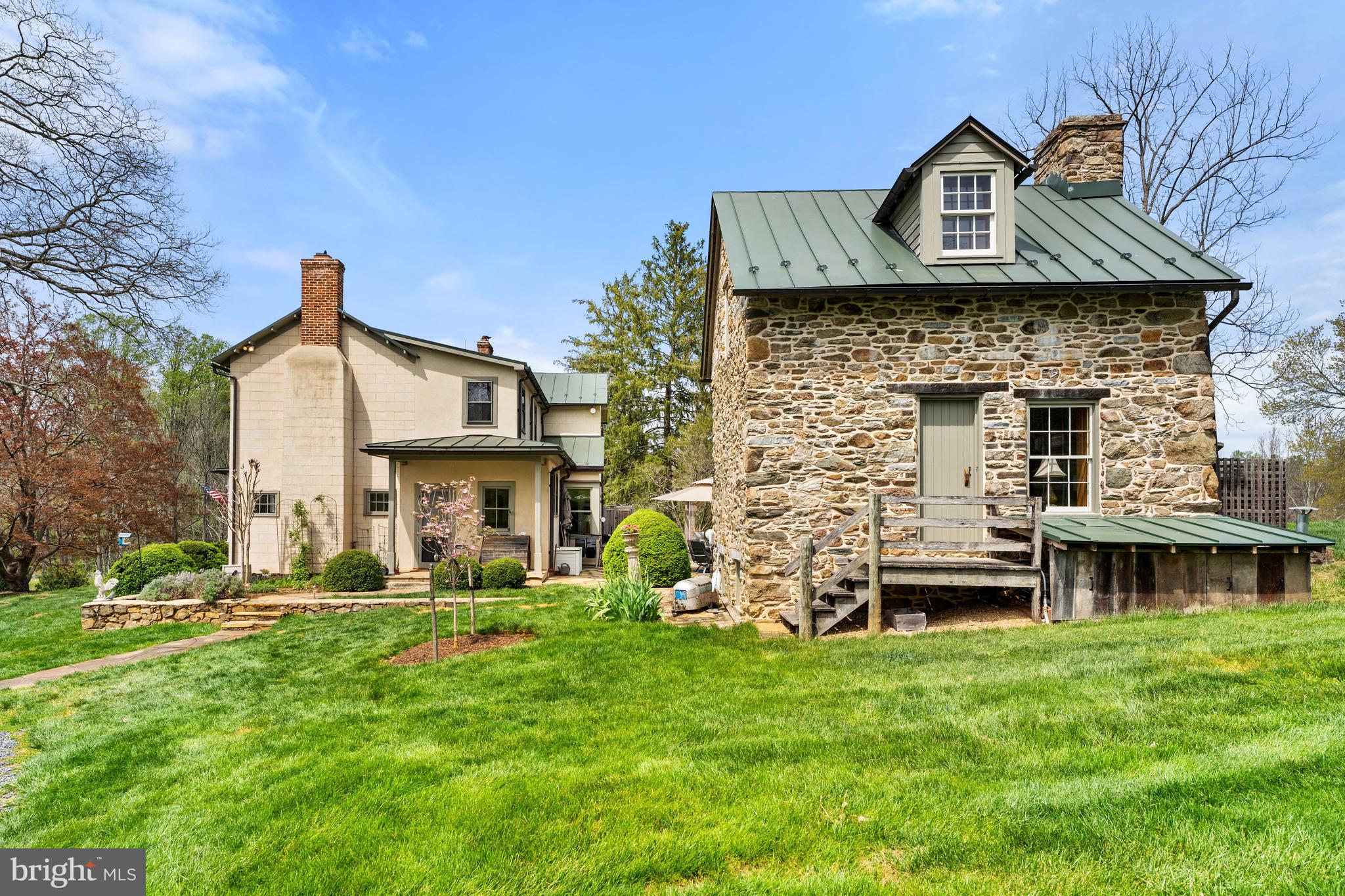 3459 Carrington Road Delaplane, VA 20144 - Photo 48 of 106 a front view of a house with a garden