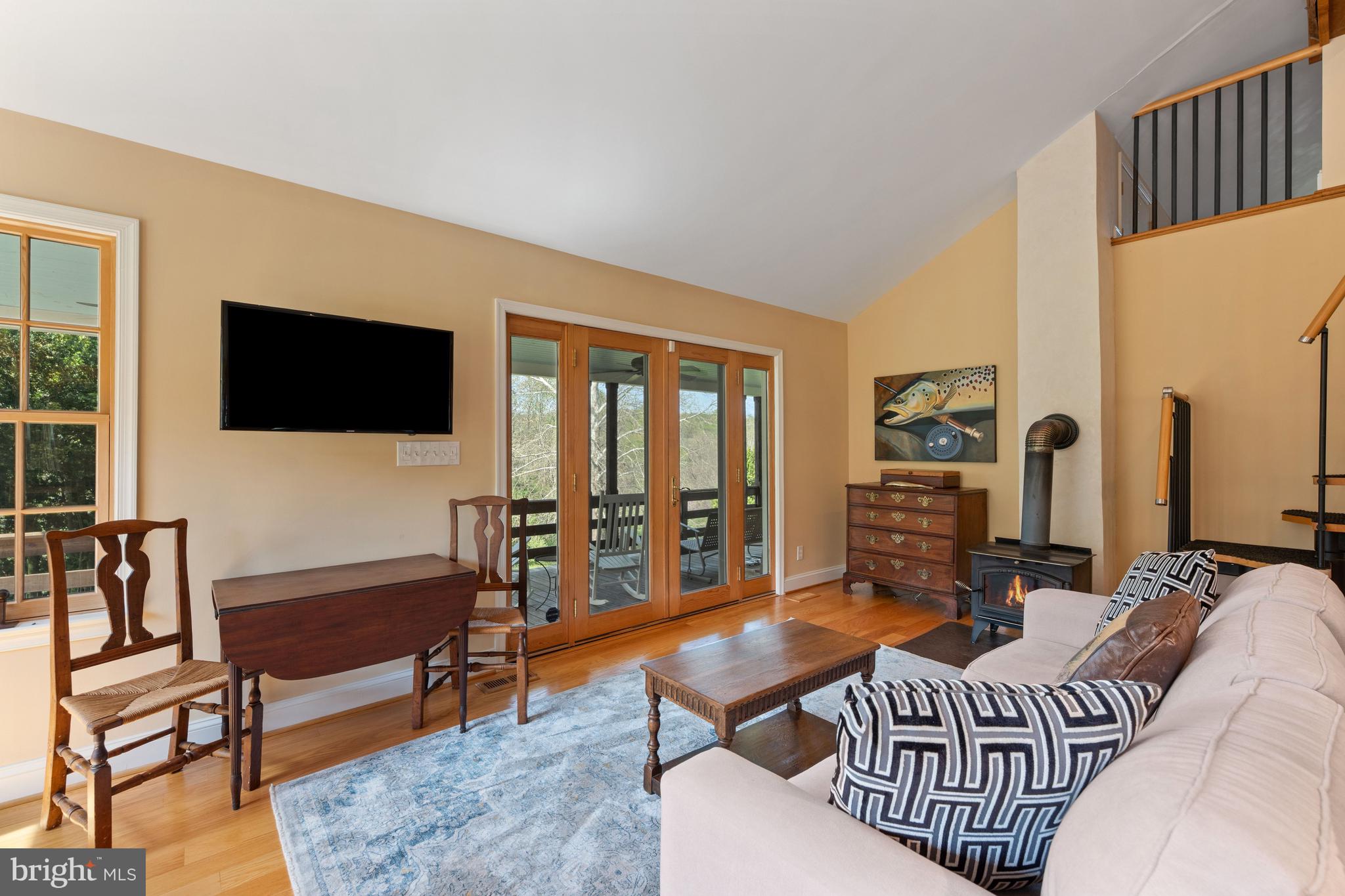 3459 Carrington Road Delaplane, VA 20144 - Photo 55 of 106 a living room with furniture and a flat screen tv