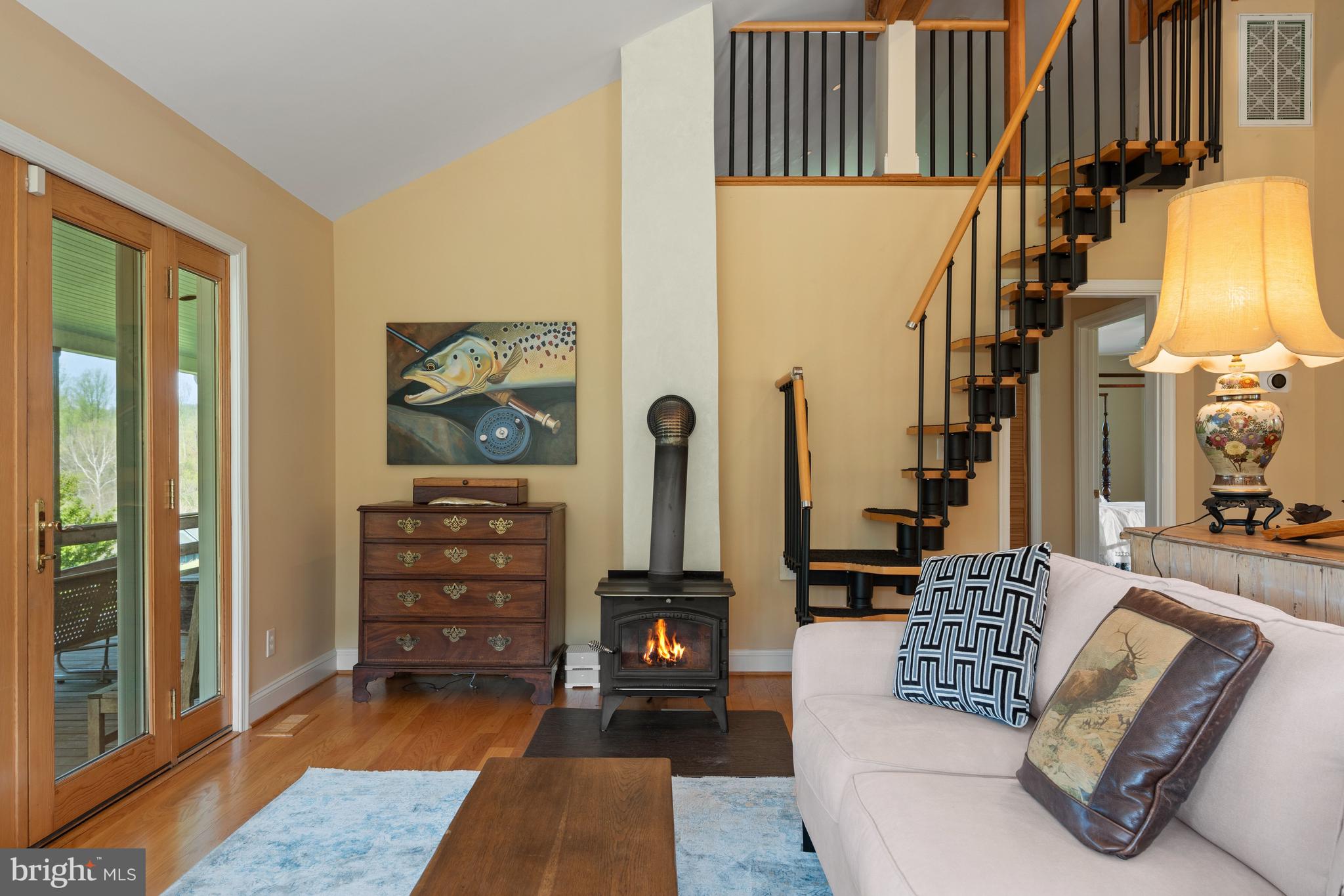 3459 Carrington Road Delaplane, VA 20144 - Photo 56 of 106 a living room with furniture and a painting on the wall