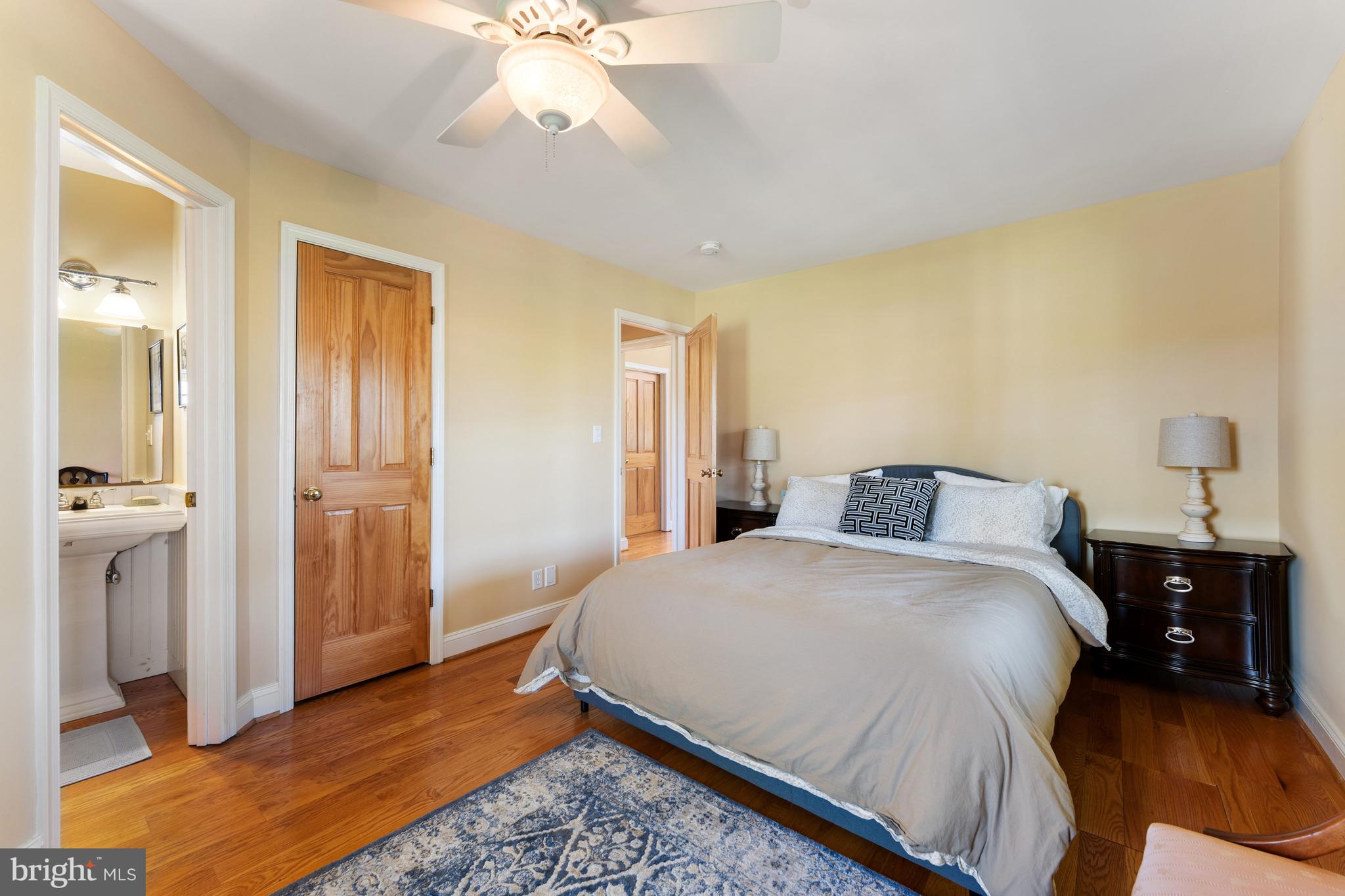 3459 Carrington Road Delaplane, VA 20144 - Photo 59 of 106 a bedroom with a bed and a mirror