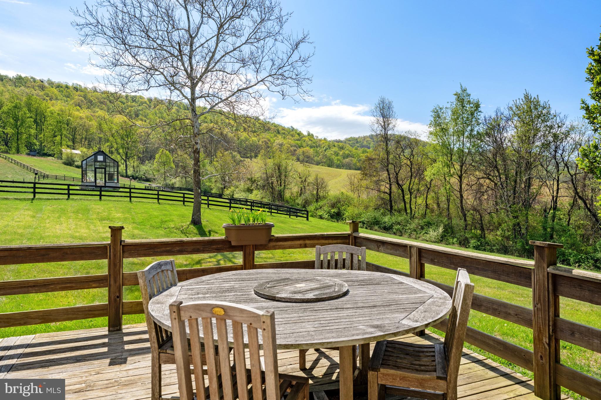3459 Carrington Road Delaplane, VA 20144 - Photo 65 of 106 a view of a city from a balcony with furniture