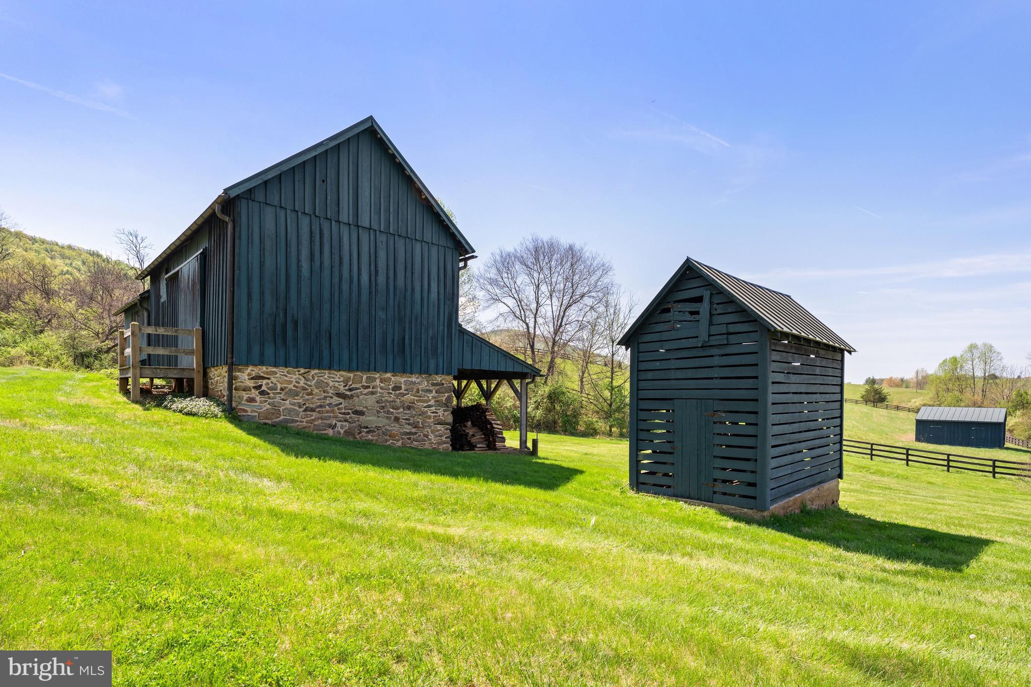 3459 Carrington Road Delaplane, VA 20144 - Photo 69 of 106 a view of a house with a yard and garage