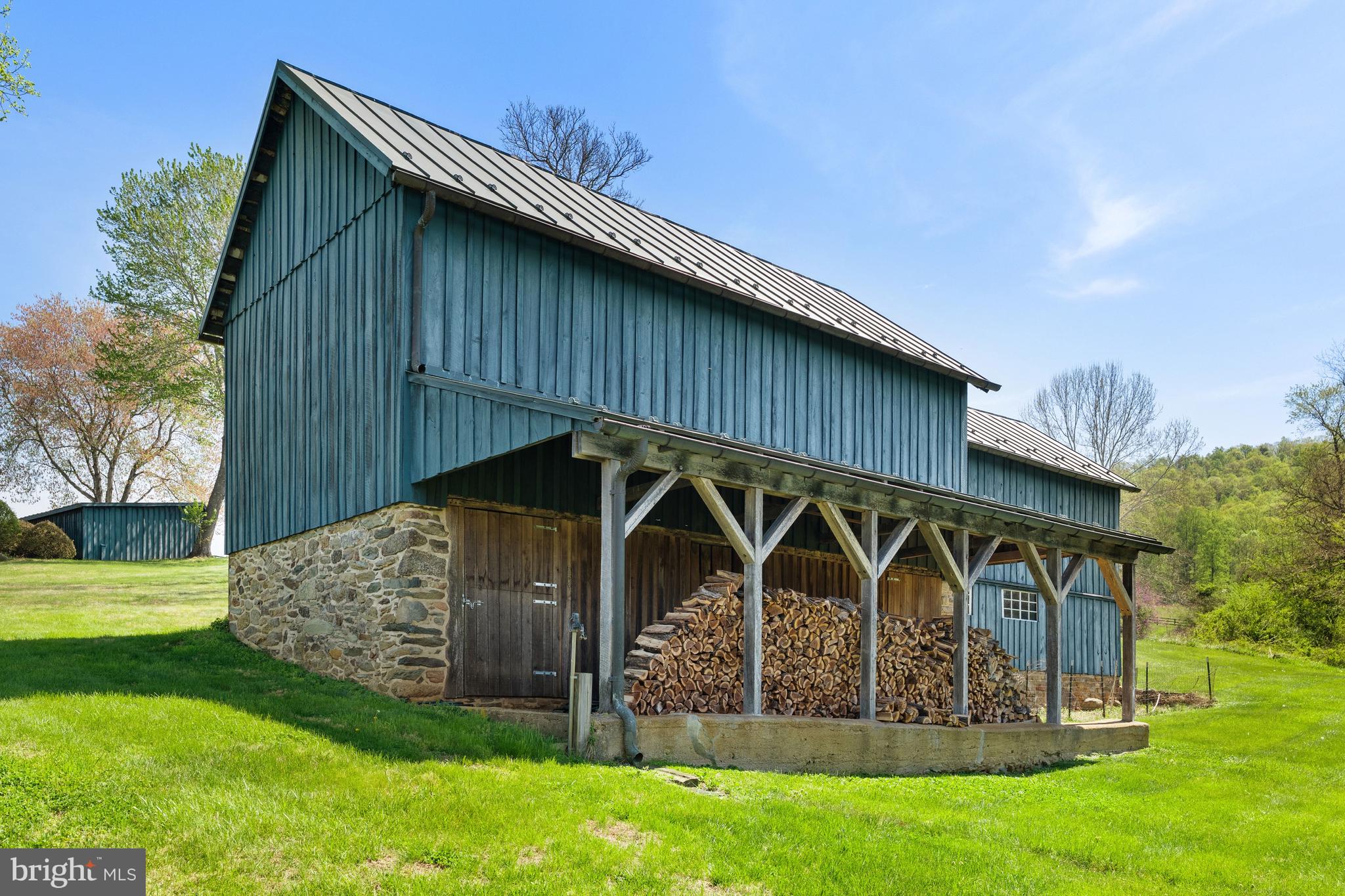 3459 Carrington Road Delaplane, VA 20144 - Photo 72 of 106 a view of a wooden house with a yard
