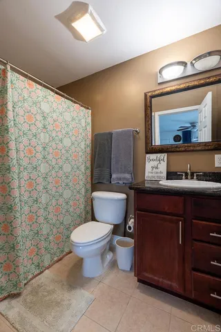 a view of a hallway with shelves