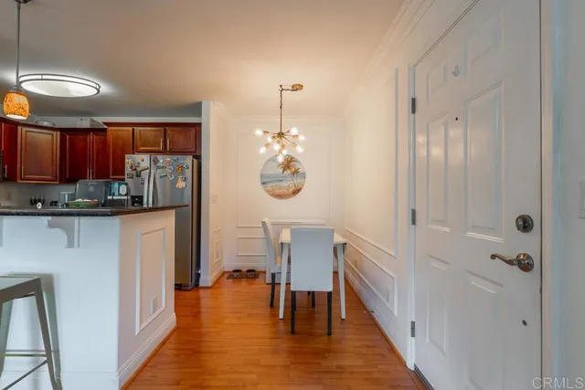 a kitchen with stainless steel appliances granite countertop a stove and a sink