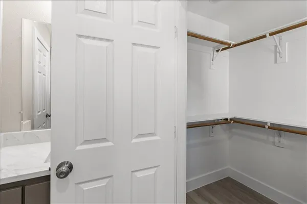 a view of a room with racks on the wall