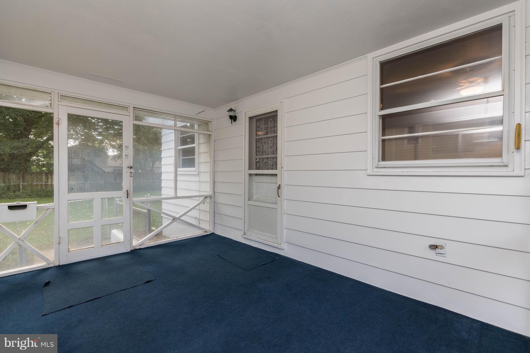 210 Gibson Road Annapolis, MD 21401 - Photo 13 of 30 Screened porch over looks rear yard