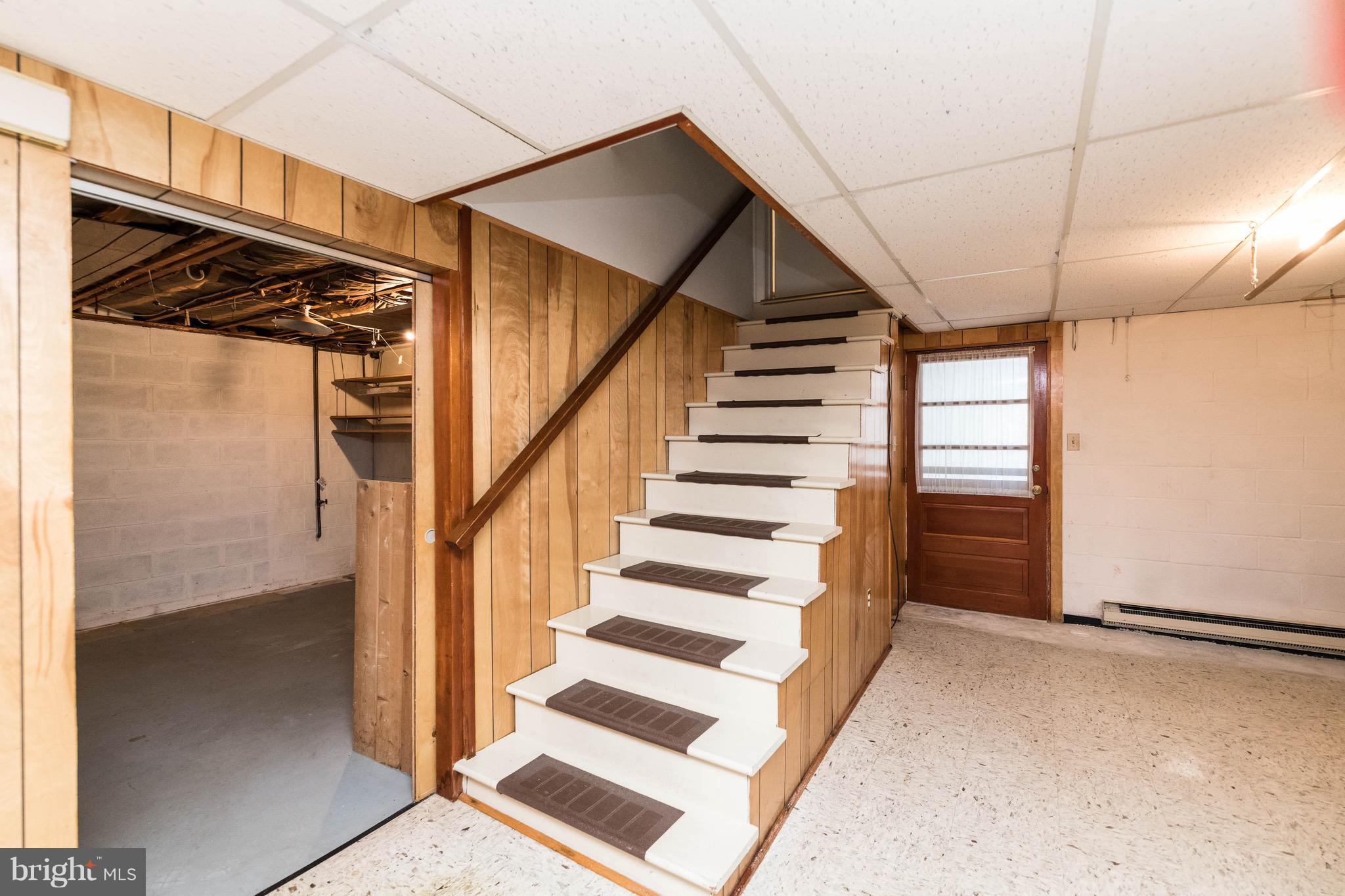 210 Gibson Road Annapolis, MD 21401 - Photo 21 of 30 Basement stairs leading to large laundry area