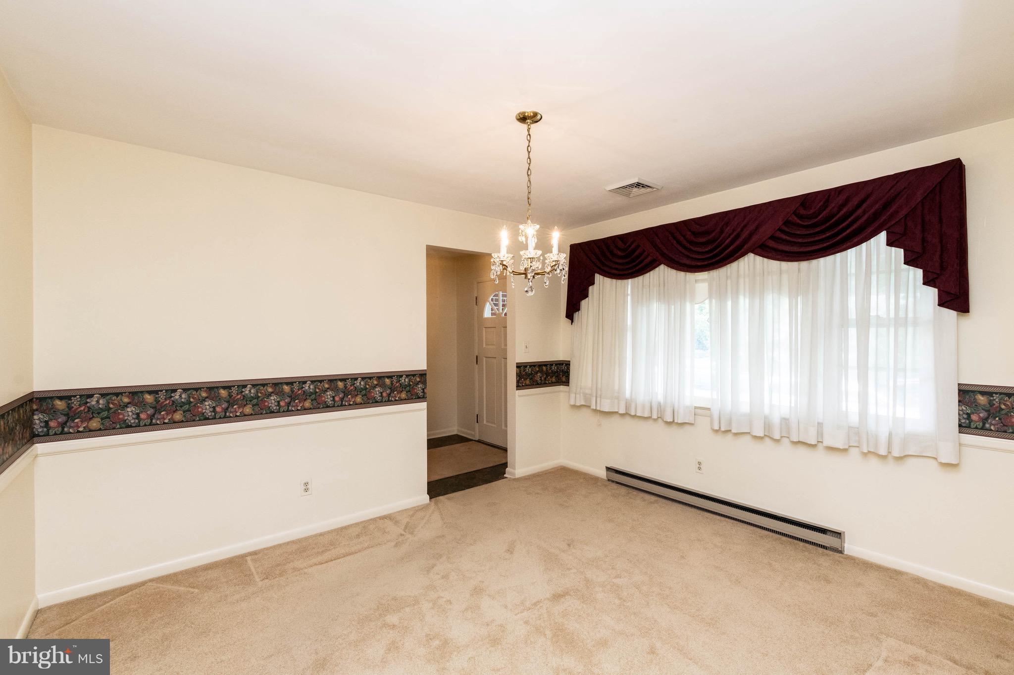 210 Gibson Road Annapolis, MD 21401 - Photo 6 of 30 Formal Dining room w/ large windows