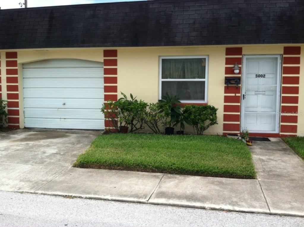 5002 Allner Street, Unit 5002 New Port Richey, FL 34652 - Photo 1 of 1 Welcome home to this delightful 2 bedroom 1 bath Condo.. with one car Garage.