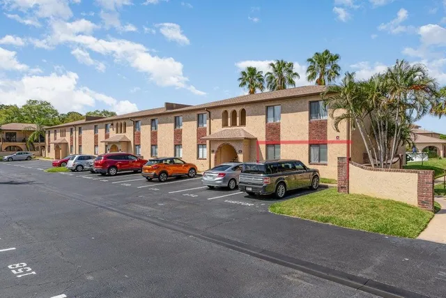 a car parked in front of a house