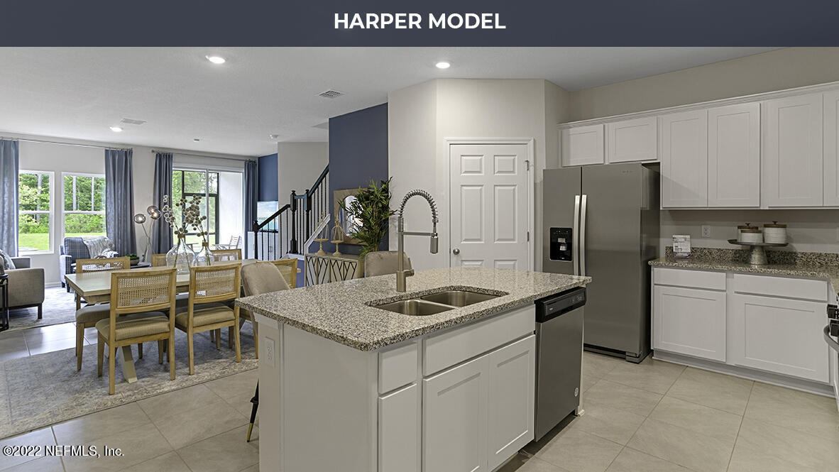55 Java Lane St. Augustine, FL 32092 - Photo 5 of 38 a kitchen with refrigerator and furniture