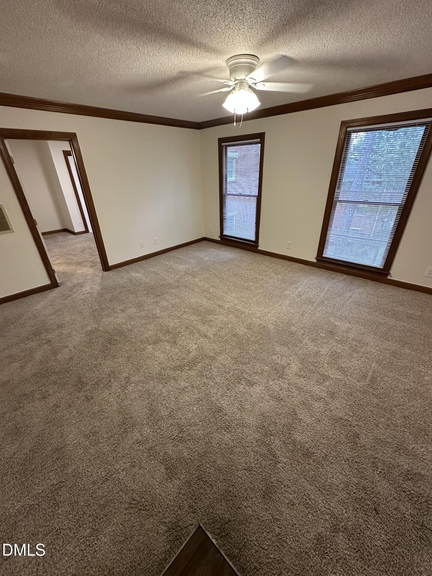 3535 Ivy Commons Drive, Unit 302 Raleigh, NC 27606 - Photo 1 of 9 a view of an empty room