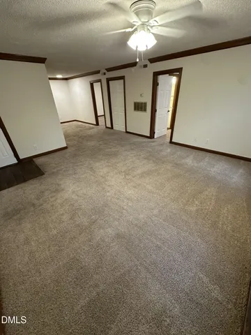 a view of a livingroom with a fireplace