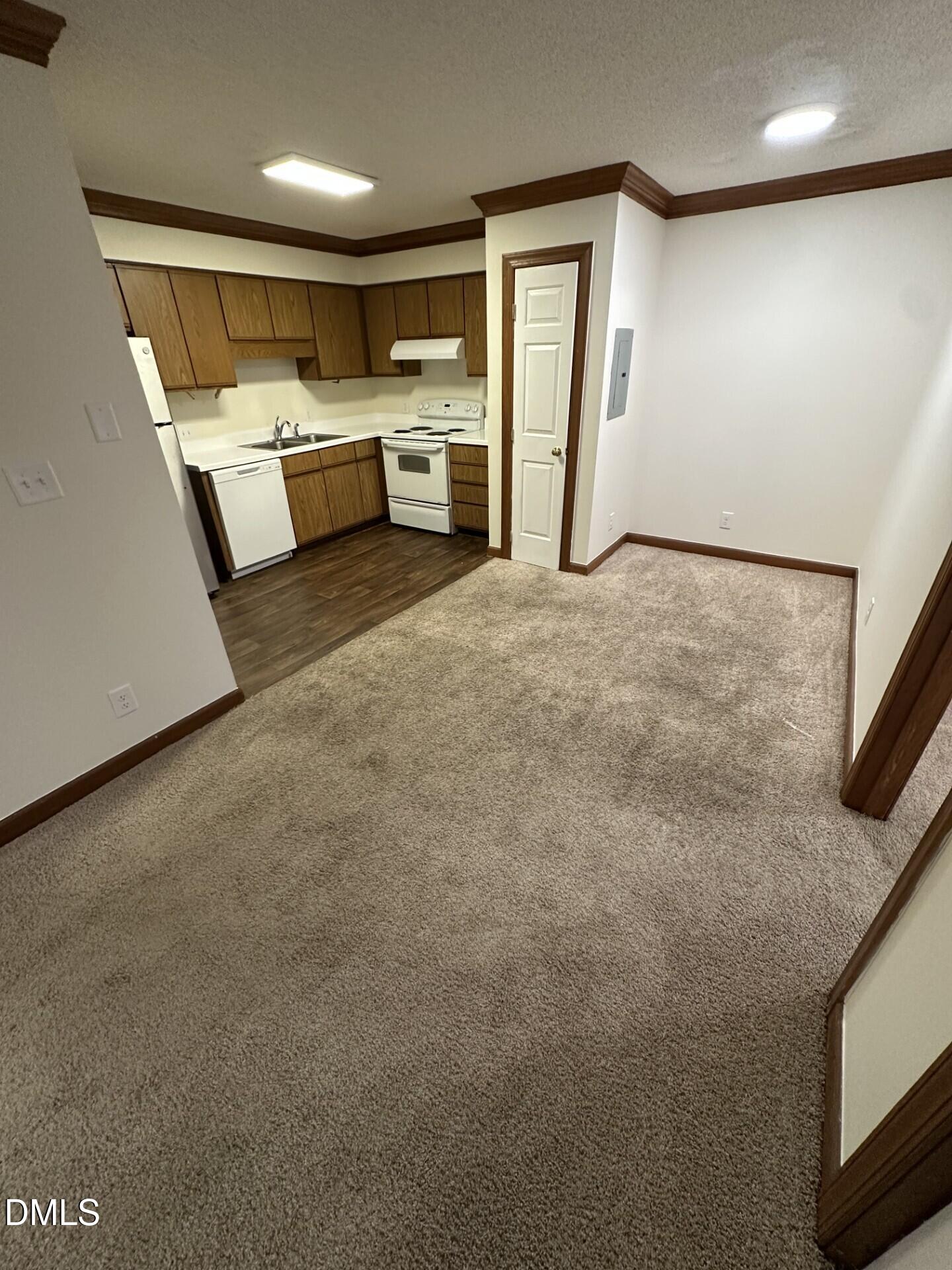 3535 Ivy Commons Drive, Unit 302 Raleigh, NC 27606 - Photo 3 of 9 a very nice looking room with a large window