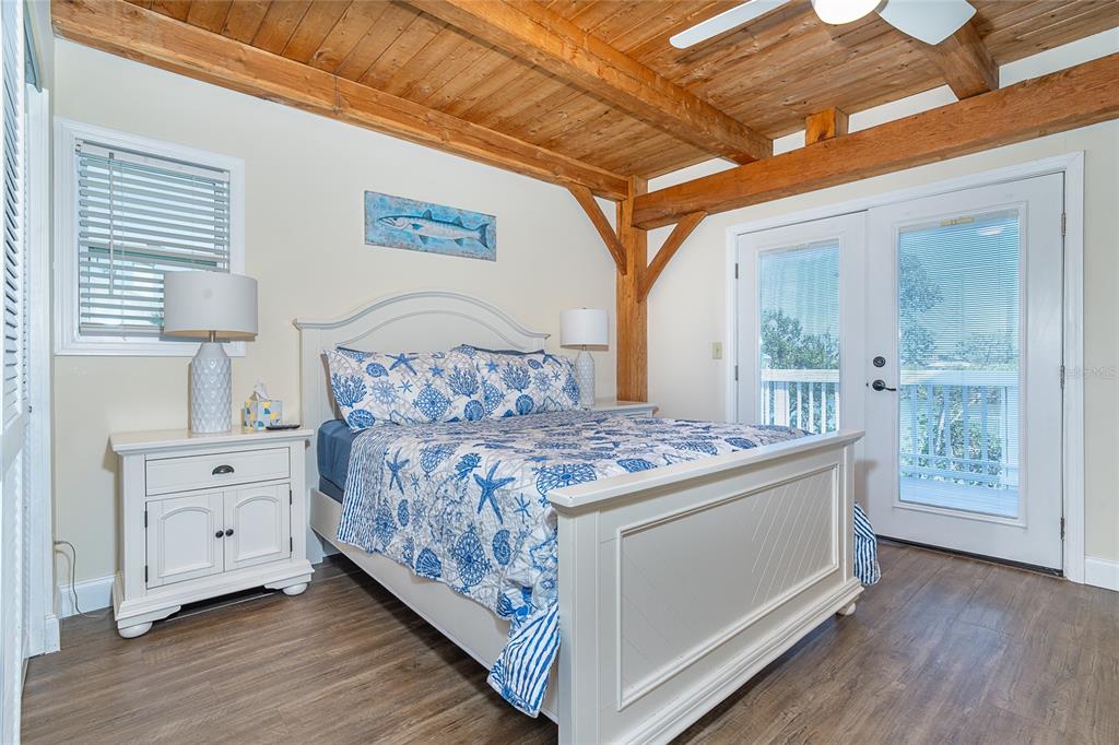 360 South Gulf Boulevard Boca Grande, FL 33921 - Photo 17 of 64 a room with a bed and a dresser