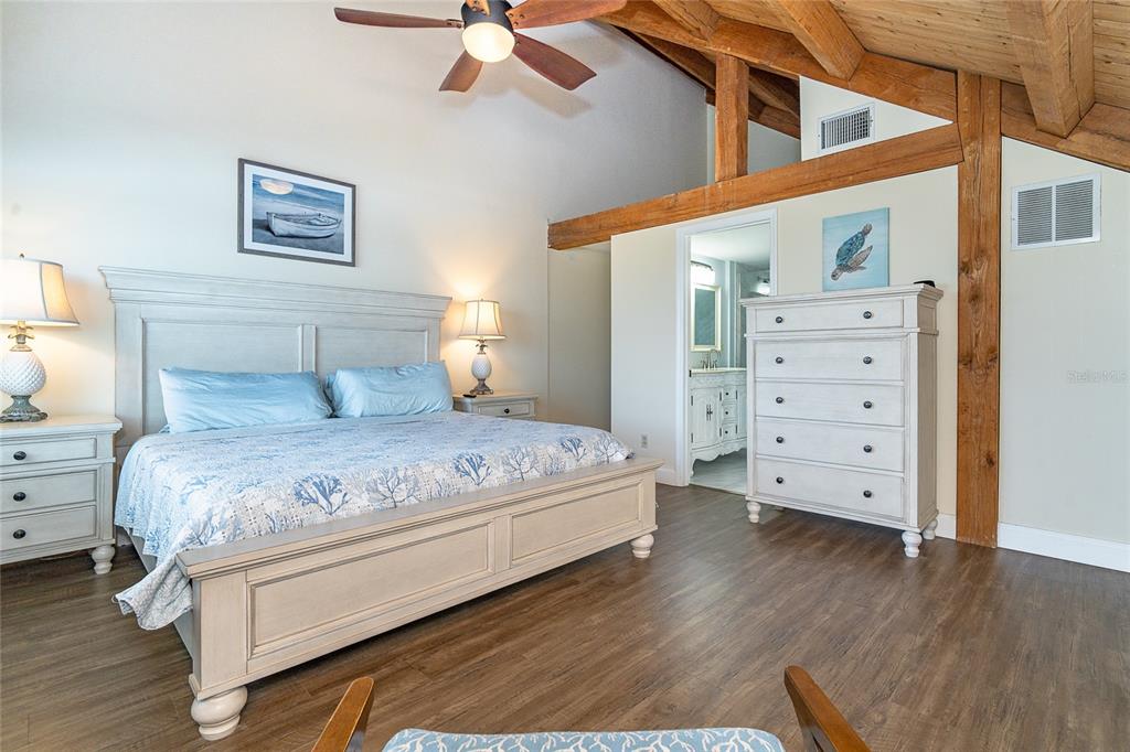 360 South Gulf Boulevard Boca Grande, FL 33921 - Photo 23 of 64 a bedroom with a bed and a view of room