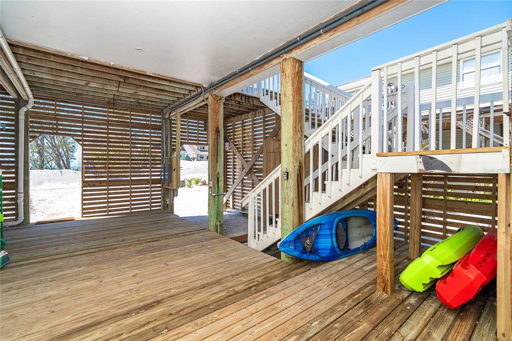 360 South Gulf Boulevard Boca Grande, FL 33921 - Photo 29 of 64 a view of front door of house with wooden floor