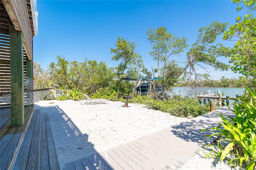 360 South Gulf Boulevard Boca Grande, FL 33921 - Photo 37 of 64 a view of a backyard of the house